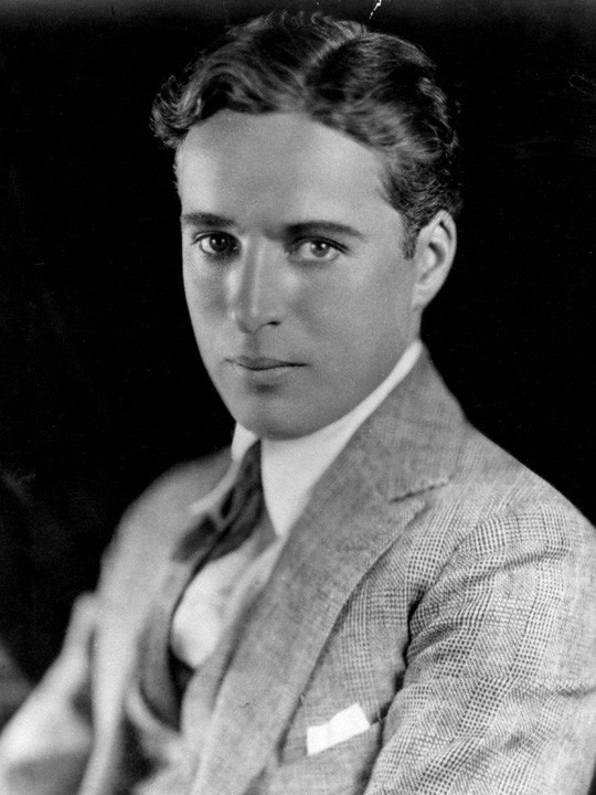 Charlie Chaplin portrait circa 1920.  Photo Credit: © Public Domain via Strauss-Peyton Studio.